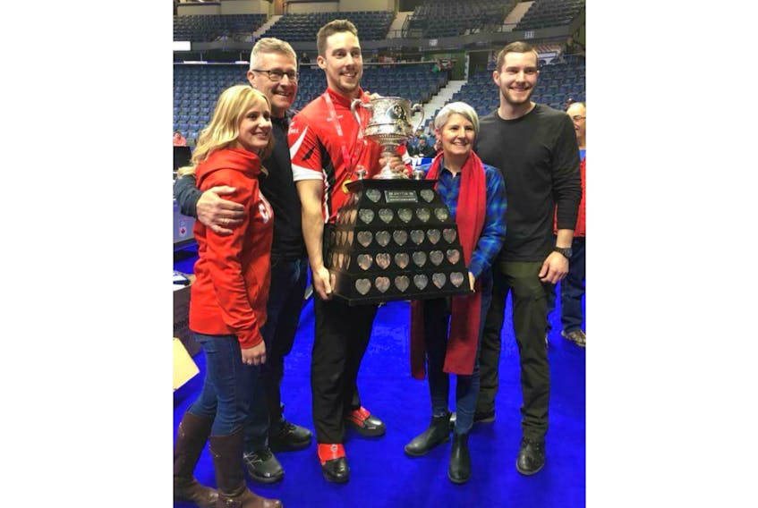 Members of Peter Gallant’s family pose with the winners trophy at the recent Tim Hortons Brier in Regina, Sask., won by his son Brett Gallant, second stone with the Team Canada rink skipped by Brad Gushue. From left are second stone with the Chelsey Carey rink Jocelyn Peterman, Peter Gallant, Peter’s son Brett, his wife Leanne Gallant and second son Christopher Gallant.