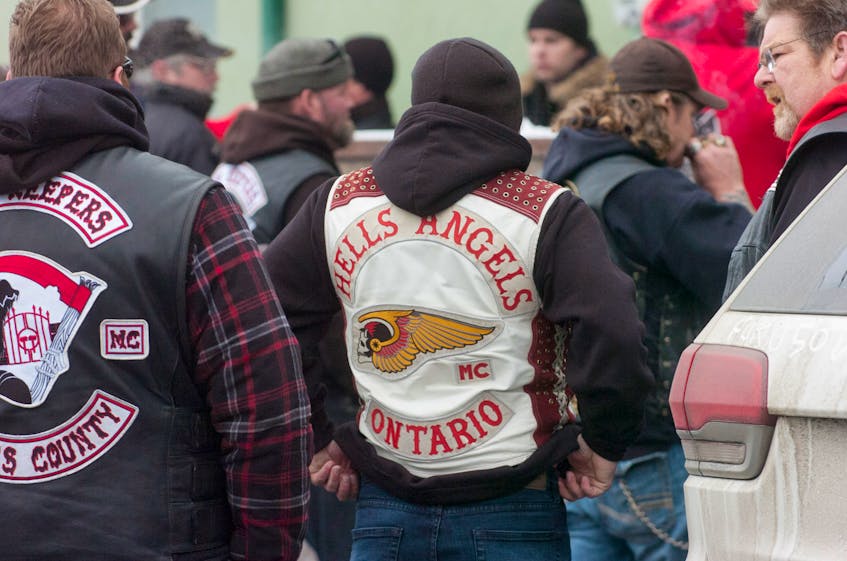 A member of the London, Ont. chapter of the Hells Angels attends a gathering held in Charlottetown last year. Legions across the country are preparing to instate a policy that would not allow motorcyclists wearing “outlaw motorcycle club” colours and logos to enter their premises.