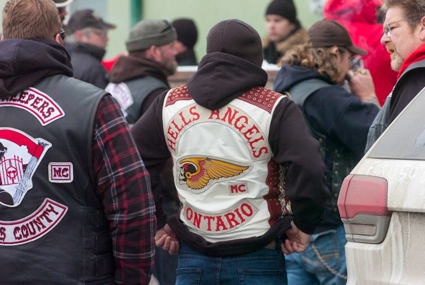 A member of the London, Ont. chapter of the Hells Angels attends a gathering held in Charlottetown last year. Legions across the country are preparing to instate a policy that would not allow motorcyclists wearing “outlaw motorcycle club” colours and logos to enter their premises.