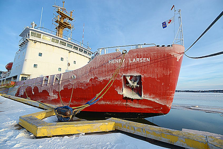 The Canadian Coast Guard Ship Henry Larsen is moored at the former coast guard wharf in Charlottetown Wednesday after the ship cut a path through the ice in the Charlottetown harbour so the Irving Oil tanker Acadian could make it to the wharf to offload its cargo.  ©THE GUARDIAN