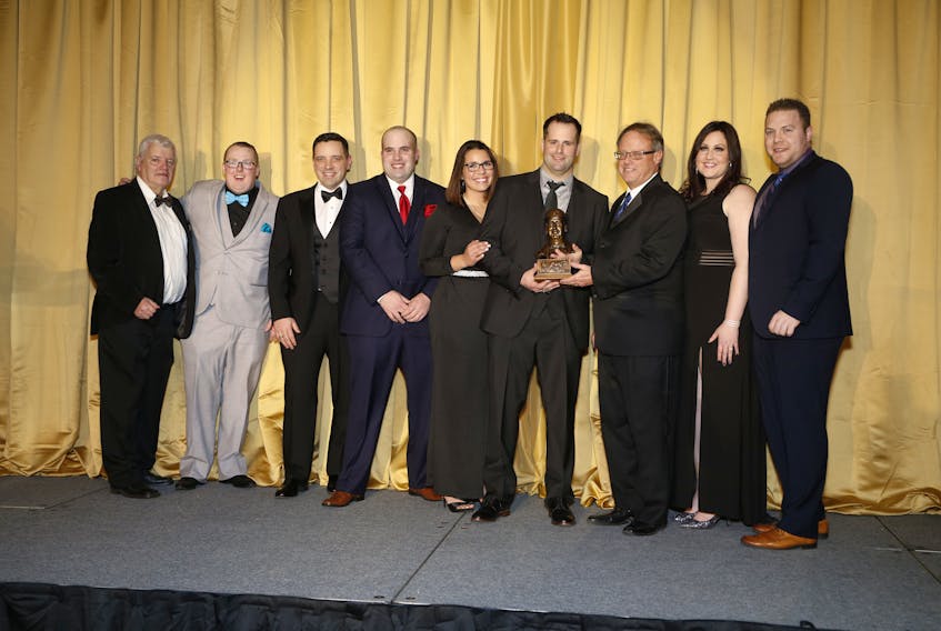Marc Campbell, fourth from right, receives the O'Brien award for horsemanship from Standardbred Canada vice-chairman Jackson Wittup during a ceremony in Mississauga, Ont., on Saturday night. Iron Horse Photo