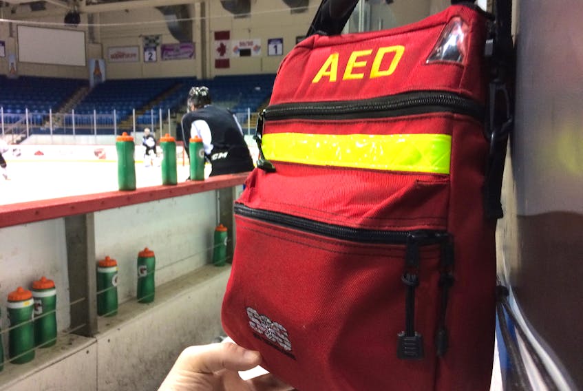 An automated external defibrillator (AED) is located behind the bench during a recent Charlottetown Islanders practice.