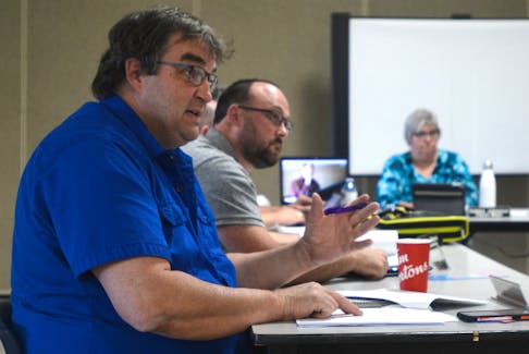 Coun. Gerard Holland, from left, speaks during last week’s Three Rivers council meeting while Coun. Cody Jenkins and Deputy Mayor Debbie Johnston listen.