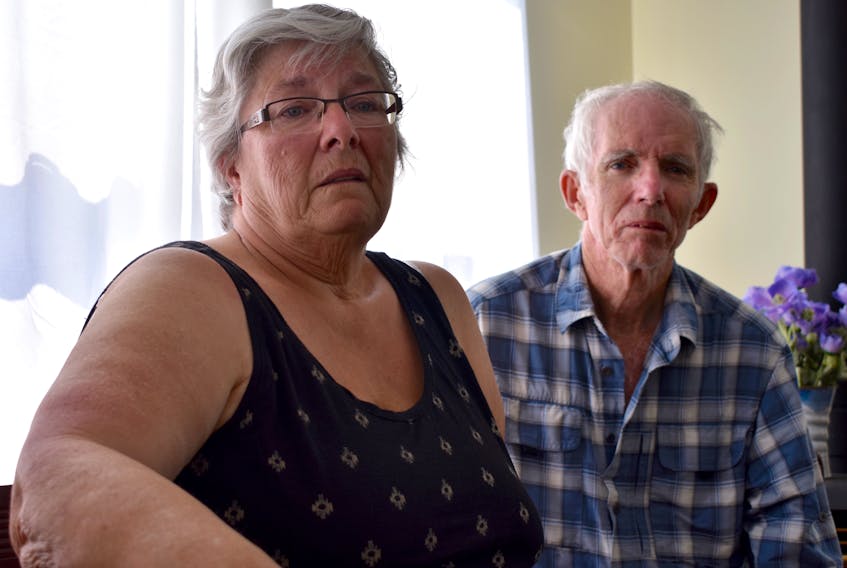 Janet and James MacDonald, shown recently at a cottage where they are spending some time with family, are rebuilding their lives after a fire devastated their apartment building on Harley Street in July.