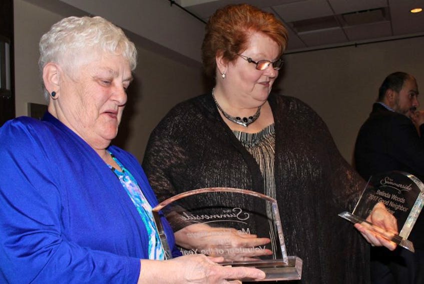Elma Noye, left, and Belinda Woods chat about their awards after this year’s Summerside Annual Awards Gala last week.