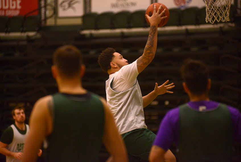 Forward Vernelle Johnson gets to the rim during UPEI Panthers men's basketball practice Thursday.
