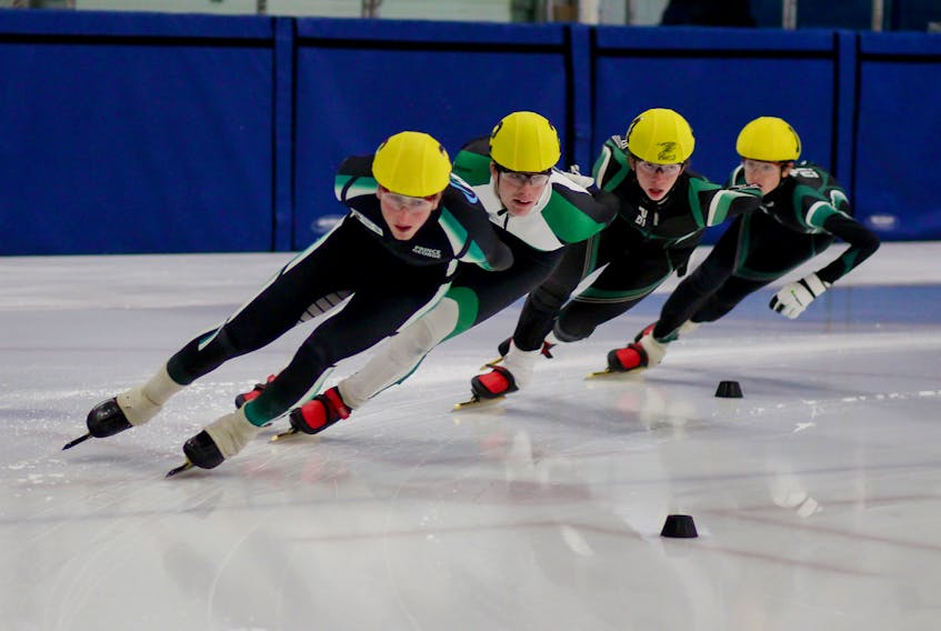 Island speed skaters Peter McQuaid, left, Andrew Binns, second from left, and Kyle Connell, second from right, racked up strong results at a recent competition in Lévis, Que. Kristen Binns/Special To The Guardian