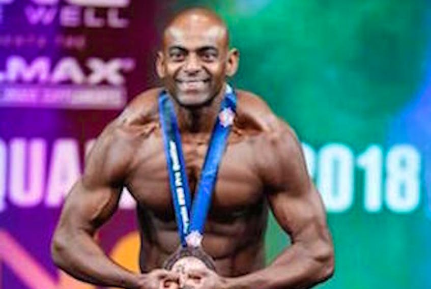 Charlottetown’s Christo Jose poses with his bronze medal won at the recent GNC Allmax Supershow in Toronto.