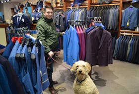 Jeremy MacFadyen is happy to hear that Downtown Charlottetown Inc. (DCI) is compiling a list of pet-friendly businesses to make it easier for him to know where his dog, Gertie, is welcome. One of those pet-friendly businesses is Dow’s Men’s Wear, pictured here.