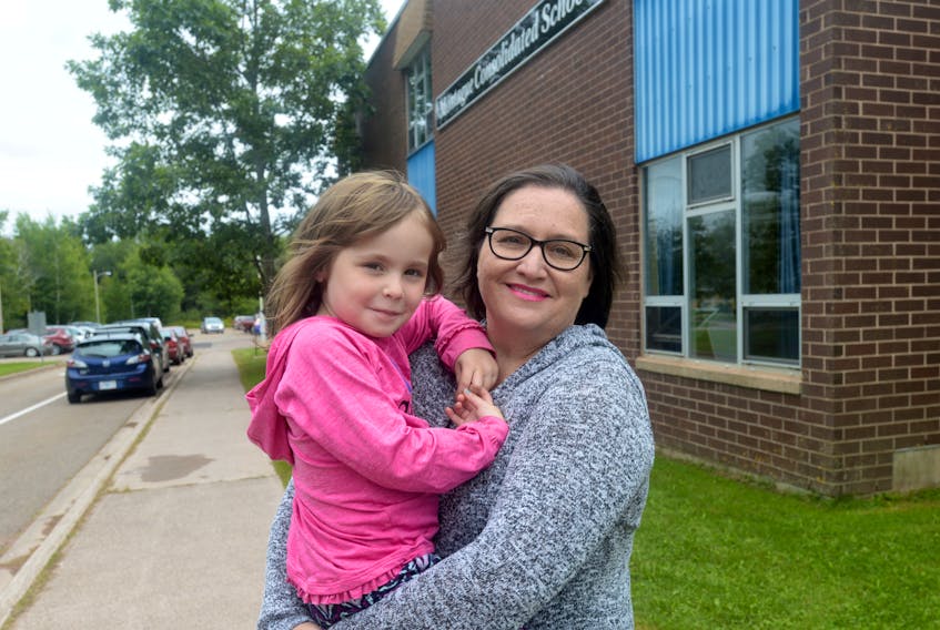 Debra Matheson picks up her daughter, Ruth, from school at Montague Consolidated. Ruth is in Kindergarten at the school, which some parents and the area’s MLA say is running out of space and in need of a replacement or upgrades.