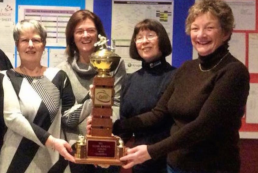 From left to right, skip Shirley Berry, third Janice Murdoch, second Arleen Harris and lead Kim Nicholson display their trophy after winning the P.E.I. senior women’s curling championship Sunday in Crapaud.