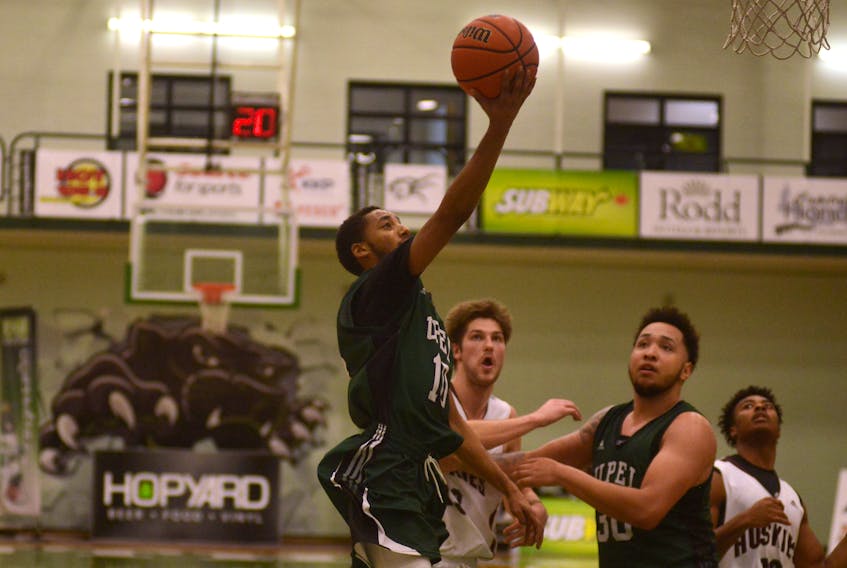 UPEI Panthers point guard Amin Suleman goes to the rim Saturday against the Saint Mary's Huskies.