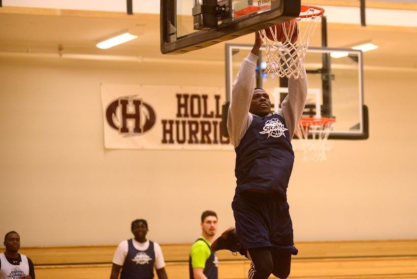 Franklin Session goes in for a dunk during the Island Storm’s practice. Jason Malloy/The Guardian