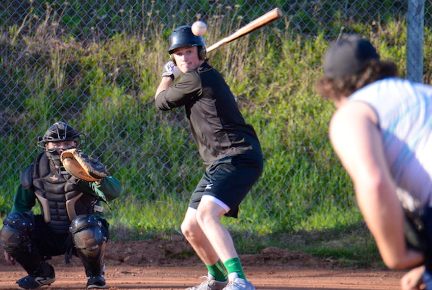Summerside’s Logan MacDougall keeps his eye on a pitch delivered by Montague’s Brett Hicken in batting practice at a recent P.E.I. Junior Islanders practice in East Royalty. Chasse Gallant from Summerside is behind the plate. The Islanders open the 2018 New Brunswick Junior Baseball League season against Chatham on Saturday in Charlottetown.