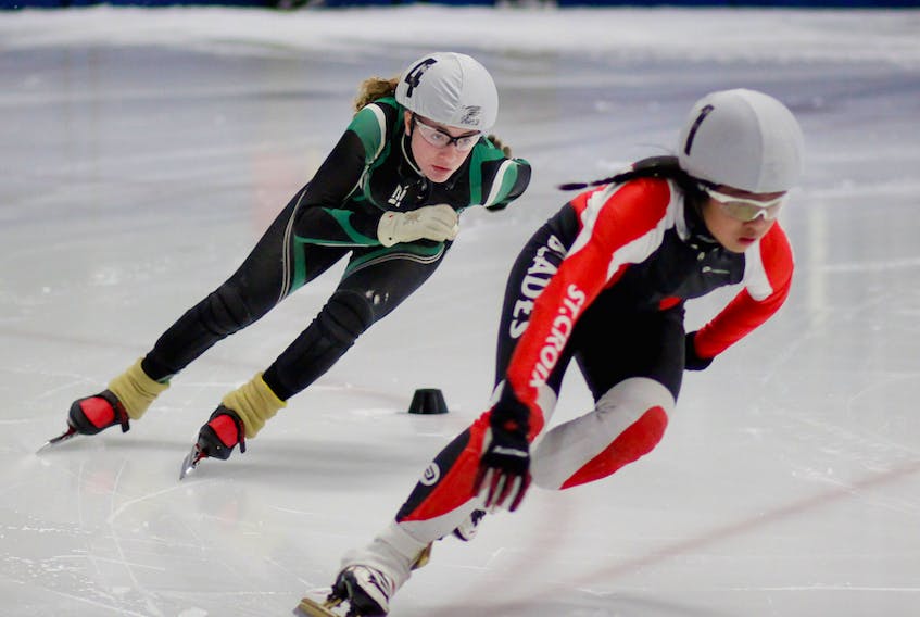 Mia Stewart, left, is shown skating at a speed-skating event in Halifax, N.S. Stewart won a gold medal for P.E.I. at a recent short track speed skating competition in Hampton, N.B.  
Photo special to The Guardian by Kristen Binns Photography.