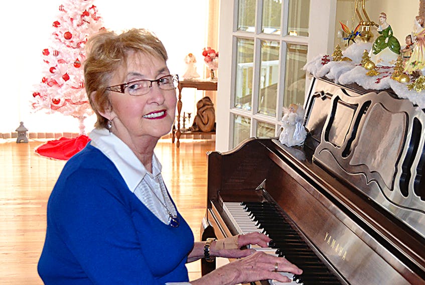 Ruth Lewis practises music at her home. The Charlottetown volunteer was recently recognized for her volunteer work by the Prince Edward and Beach Grove homes.  ©THE GUARDIAN
