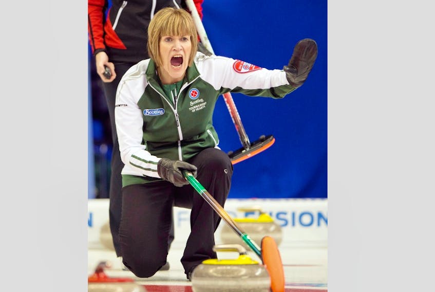 Skip Kim Dolan yells to sweepers during the Scotties Tournament of Hearts. Submitted