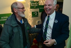 Green leader Peter Bevan-Baker is congratulated by a party supporter after winning re-election Tuesday. The Greens formed the official opposition with eight seats.