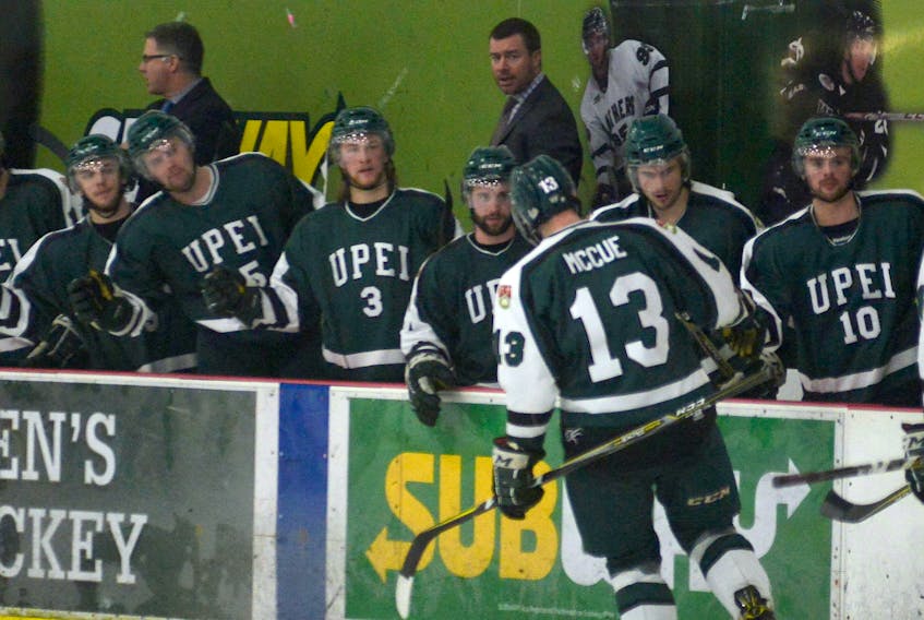 UPEI Panthers forward Beau McCue celebrates his power-play goal with teammates Wednesday at MacLauchlan Arena.