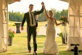 Adam McQuaid and Stephanie Enserink celebrate during their wedding reception at the Rodd Crowbush Resort last Friday. The two were married earlier that day in Charlottetown’s Christian Reformed Church. The Boston Bruins defenceman and Enserink had been dating for about four years before saying their “I do’s.” -BARBARA MCADAM/