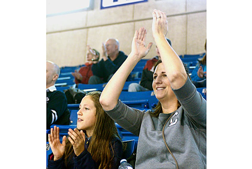 Gillian Boutilier, of Halifax, and her daughter, Jenna, cheer on some skaters during the Atlantic Cup Speed Skating Championships held at Charlottetown’s Eastlink Centre this weekend. A task force that has looked at the possibility of replacing the 26-year-old arena is expected to deliver a report in a few weeks. ©THE GUARDIAN