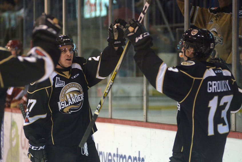 Matthew Grouchy, right, celebrates his goal with Charlottetown Islanders teammate Gregor MacLeod Tuesday at the Eastlink Centre. Jason Malloy/The Guardian
