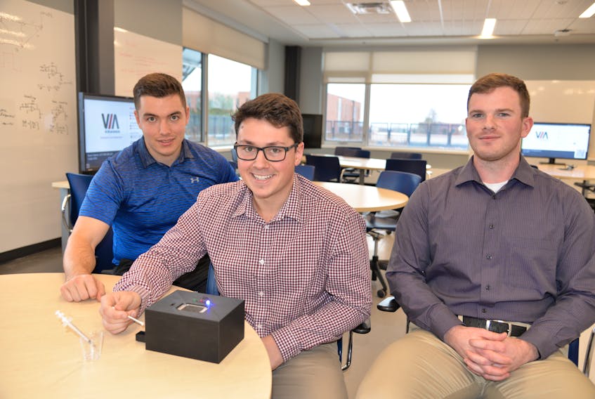 UPEI engineering students Mason Boertien, left, Bryce Stewart and Robert Smith have designed and developed a prototype of a THC breathalyzer.