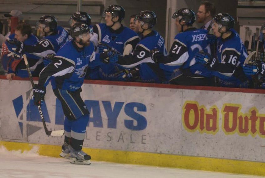 Saint John Sea Dogs defenceman Bailey Webster celebrates his first period goal against the Charlottetown Islanders Sunday at the Eastlink Centre.