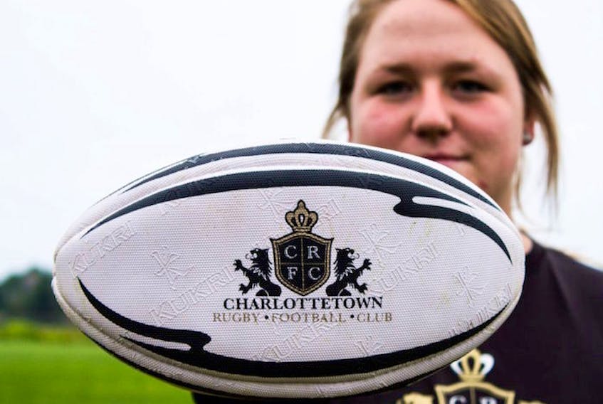 Holly Jones holds a Charlottetown Rugby Football Club rugby ball. Jones and Alysha Corrigan recently returned from a national senior women’s camp.
Submitted