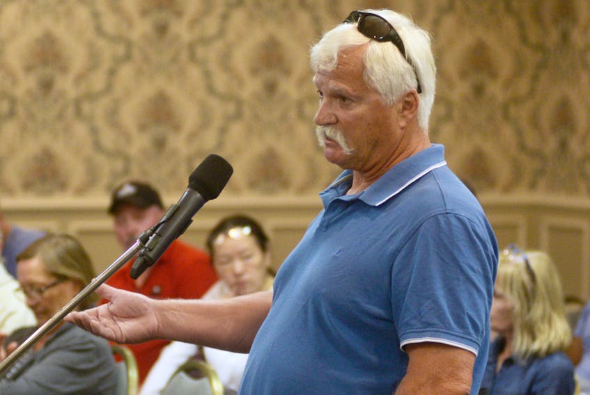 Ray Campbell speaks during a public meeting on his application to have his log home’s heritage status revoked. Planning board will now look at public feedback and make a recommendation during its meeting on Sept. 4 on whether council should approve or deny the application. Council will then vote on the issue during a meeting on Monday, Sept 10.