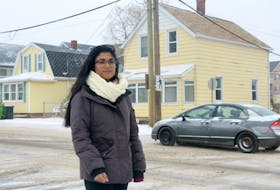 Grade 10 Colonel Gray student Chanuthi Kongahawattege stands at the intersection of Pond and Queen streets in Charlottetown. Chanuthi has started a petition to create safety improvements at the intersection and has received 130 signatures within four days.