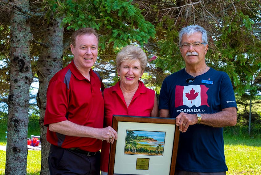 Mayor David Dunphy is shown with Stratford volunteers Pam Ing and David Ing. They are the recipients of the MacDougall-MacIntyre Senior Volunteer of the Year Award.