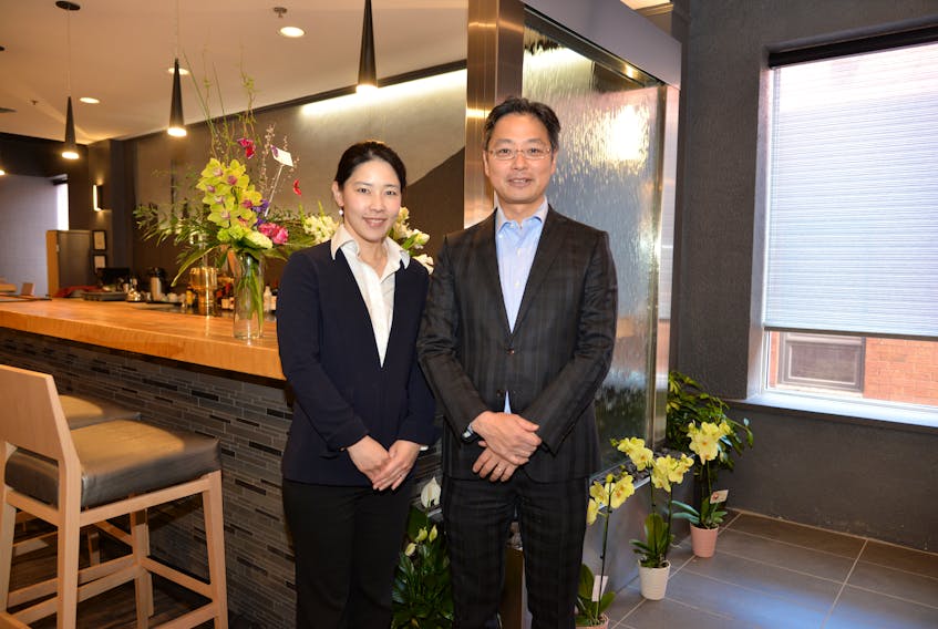 Yuichi Hojo, right, is the owner of Hojo’s Japanese Cuisine. The new Japanese restaurant opened on Wednesday. Hojo is seen here with his wife, Tomomi.