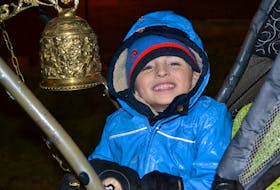 Elliot Gallant, 5, of Charlottetown rings his bell as part of the annual Jingle Bell Walk in Charlottetown Dec. 1.