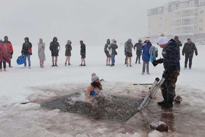 Islanders take part in the 2019 P.E.I. Polar Bear Dip at the Charlottetown waterfront.