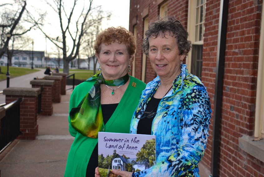 Carolyn Epperly and Elizabeth “Betsy” Epperly display the book they wrote and illustrated together, prior to the book launch at UPEI on May 2.