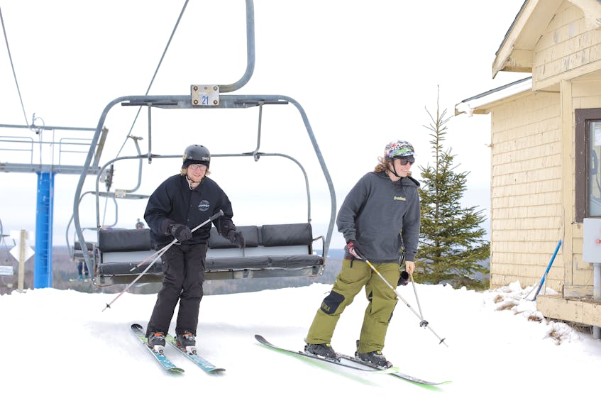 Cameron Porter, left, and Jordan Condon enjoy some skiing at Mark Arendz Provincial Ski Park at Brookvale on Saturday, Jan. 5. -Mitsuki Mori
