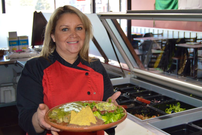 Claudia Perez Vega, owner of La Sazon de Mexico, is now serving up chicken green enchilada dishes among others on Queen Street in Charlottetown. The new restaurant just opened and the owner claims they are the only “authentic Mexican food’’ restaurant in the city.