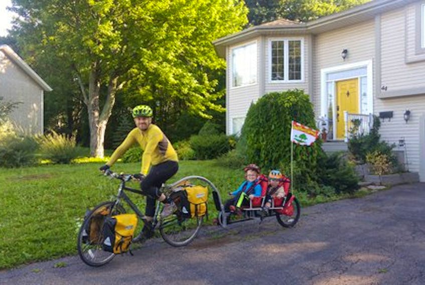 Josh Underhay was an avid cyclist in Charlottetown and always used to take his children, Oliver, left, and Linden on the bike every day. The City of Charlottetown is holding Bike to Work and School Day on Friday, June 21 in honour of Josh and Oliver who died tragically in a canoeing accident in April. Submitted