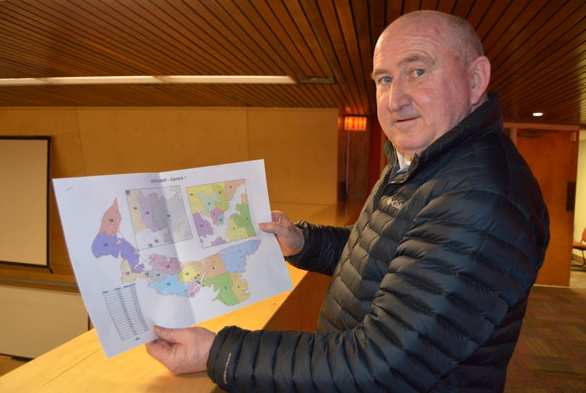 Ivan MacArthur of Charlottetown was one of approximately 60 people who attended a public input meeting in Charlottetown Thursday night about the two proposed mixed-member proportional maps for P.E.I.