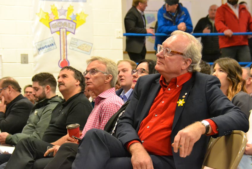 Premier Wade MacLauchlan listens to one of the speakers at the Liberal party’s annual general meeting in Cornwall on April 8, 2018.