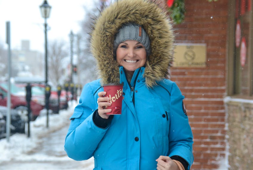 Maria O'Meara enjoys a coffee on another stormy day in Charlottetown recently. Prince Edward Island residents will be looking for plenty of hot beverages to help keep them warm this weekend as the windchill this morning will drop to -23 C, only improving to -18 C in the afternoon. The good news is the current forecast calls for a sunny week, with no major storms on the horizon.