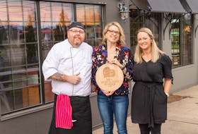 Phinley’s Diner’s Burger Love creation was named Most Loved Burger by fans. From left is Jason Horton, Phinley’s kitchen manager, Melody Dover, president of Fresh Media, and Jennifer Lawlor, owner of Phinley’s.