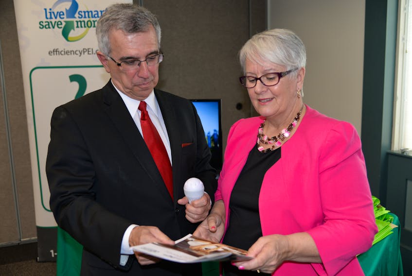 Richard Brown, minister of communities, land and environment, left, and Paula Biggar, minister of transportation, infrastructure and energy, attended Friday’s $47.8-million funding announcement for climate change programs in the province.