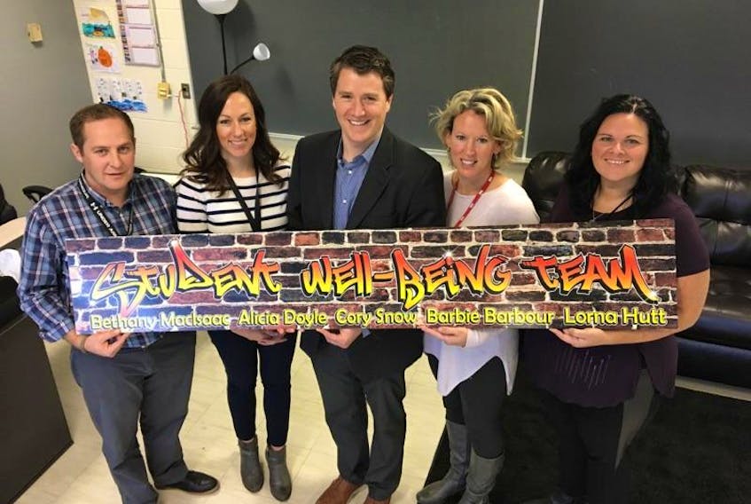Well-being team members for the Westisle family of schools, from left, youth outreach worker Cory Snow, team lead Lorna Hutt, Health Minister Jordan Brown, school health nurse Bethany MacIsaac and counselling consultant Andrea Garland meet earlier this year. The well-being team program will soon be expanded into three more families of schools.