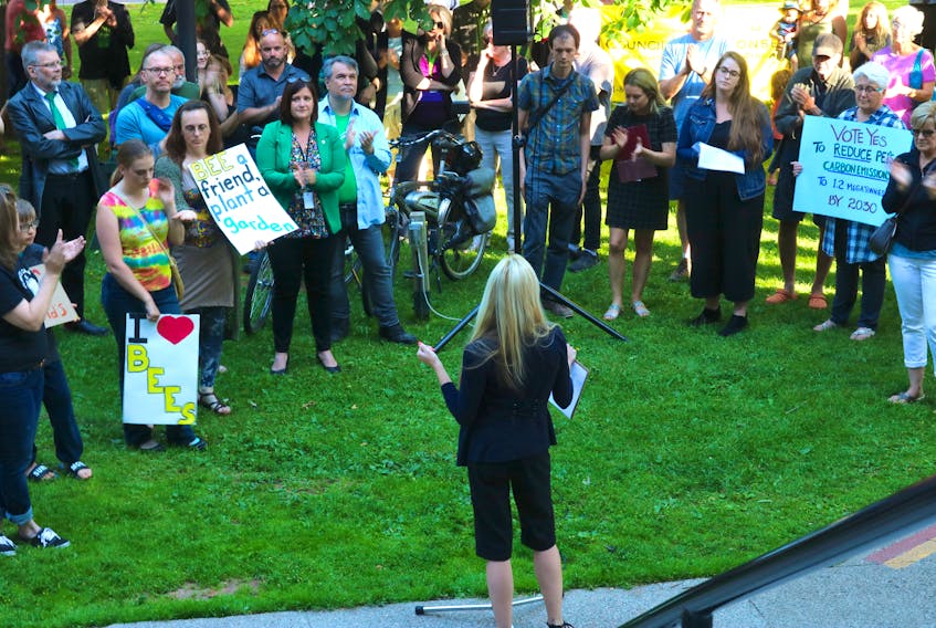 Green MLA Lynne Lund speaks before a ‘Rally for Real Climate Targets’ in front of the Coles Building on Tuesday. Lund introduced an amendment calling for the Island to adopt more stringent climate targets. The bill passed 18 to 6. Photo: Stu Neatby/The Guardian
