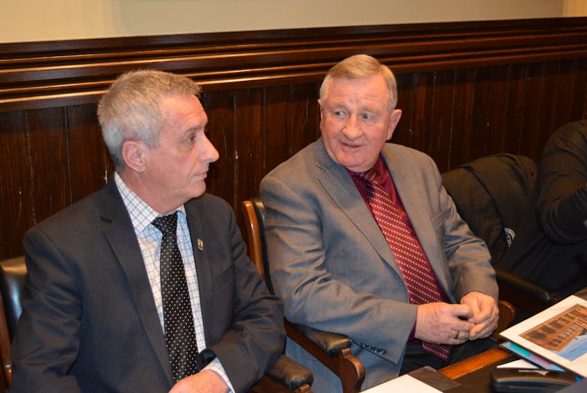 Coun. Mike Duffy, right, chairman of the public works committee, said the City of Charlottetown will launch a three-month pilot project in the spring on addressing traffic congestion along North River Road. He’s pictured here with Coun. Kevin Ramsay during council’s regular public monthly meeting on Monday.