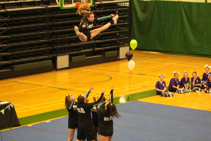 Members of the UPEI Panthers Cheerleading team demonstrated some cheerleading extensions for the crowd on Sunday during the P.E.I. Cheerleaders Show Off Showcase held at the UPEI Sports Centre.