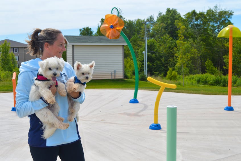 Sherri Oraniuk checks out Stratford’s new splash pad with her two friends, Zoey and Brady. The splash pad is tentatively set to open on Friday, July 20.