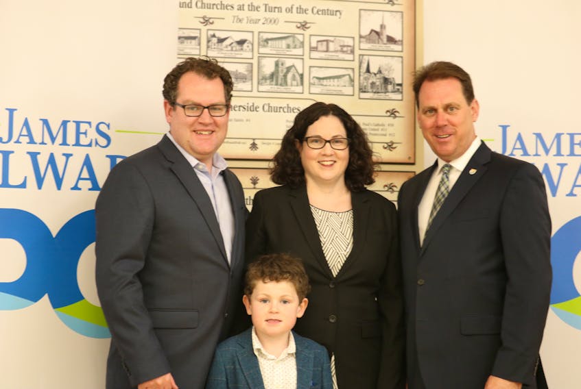 Sarah Stewart-Clark, centre, poses with her husband Fraser Clark, left, PC leader James Aylward and her son Rory. Stewart-Clark was nominated as the Progressive Conservative candidate in the new District 9 – Charlottetown-Hillsborough Park.